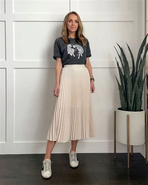 wearing pleated skirt with sneakers